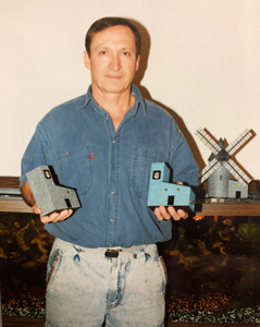 Inventor G.R. Davet with early Super Feeder prototypes