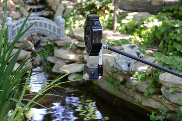 super feeder hung over koi pond