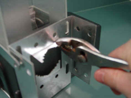 bend metal ears with pliers